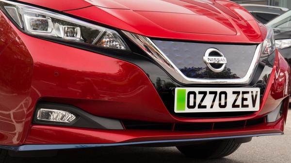 Green number plate on a Nissan Leaf