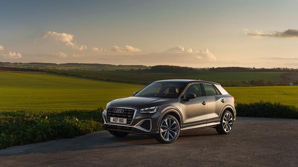 Grey Audi Q2 front side view parked off road