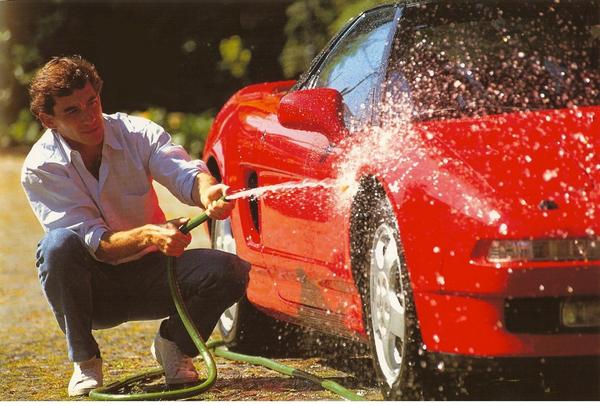 Senna washing his red Honda NSX