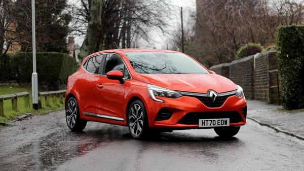 Orange Renault Clio E-tech - one of the best hybrid cars for students