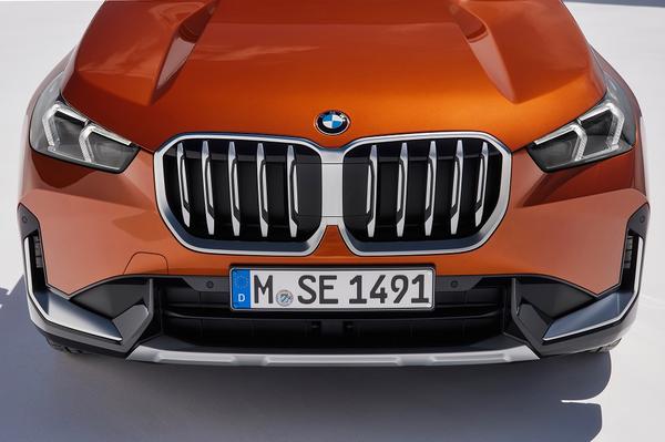 Orange BMW X1 front view