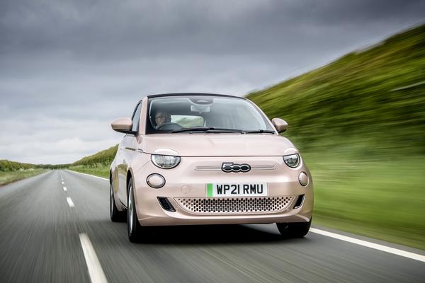 Fiat 500 electric car with a green plate