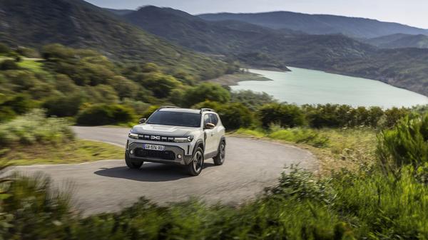 2024 Dacia Duster driving up a hill