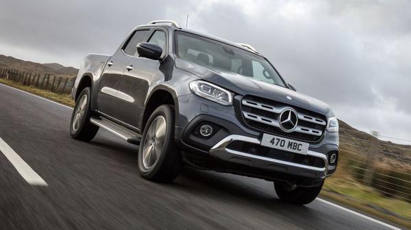 Close up of Mercedes X-Class on a stormy road