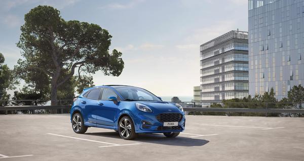 Blue Ford Puma parked on a city rooftop