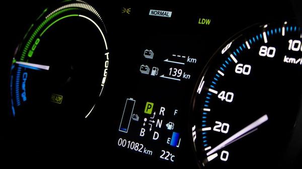 EV dashboard showing the mileage and battery capacity