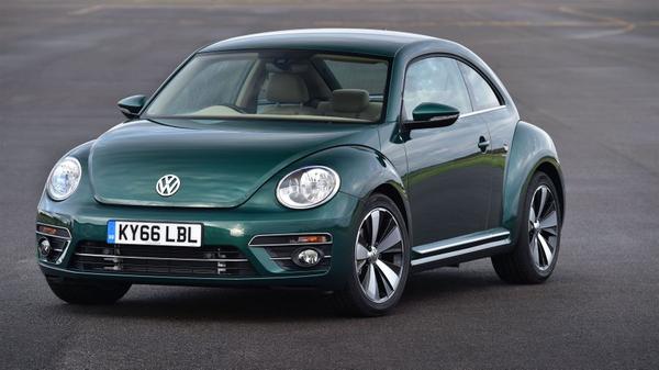 Close up of dark green Volkswagen Beetle