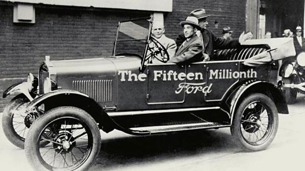 Edsel and Henry Ford in a Model T