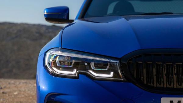 Close up of a BMW 3 Series headlamp