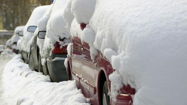 snow covered cars