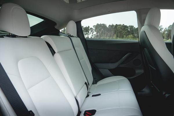White Tesla Model Y interior rear seats