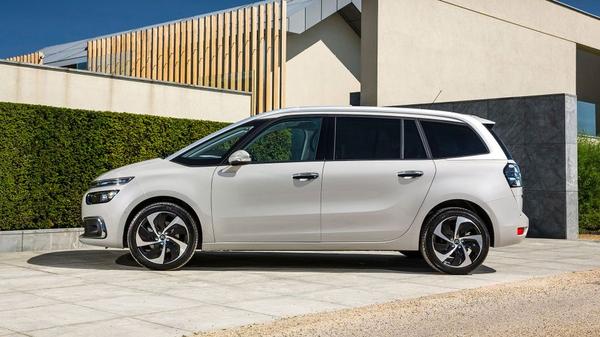 Side view of a white Citroen C4 Grand Picasso