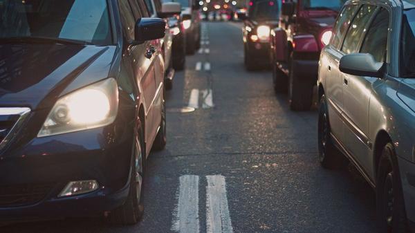 Vehicles parked on dual lanes