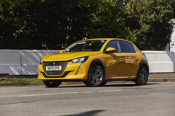 Yellow Peugeot e-208 front exterior view