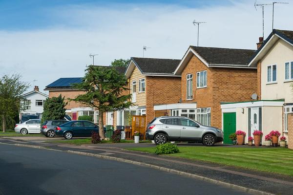 Cars parked on driveways