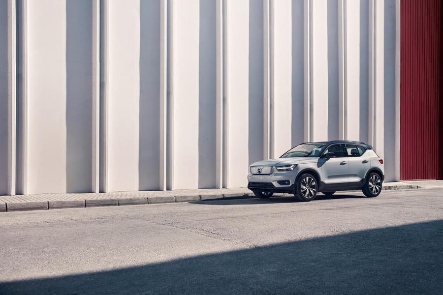 Volvo XC40 White Volvo XC40 parked in front of a white and red building