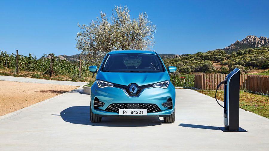 Renault Zoe Hatchback Blue Renault Zoe Hatchback parked near a charging point
