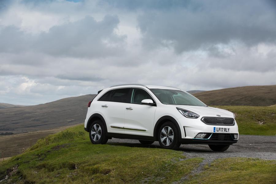 Kia Niro PHEV White Kia Niro PHEV parked on a highland moor