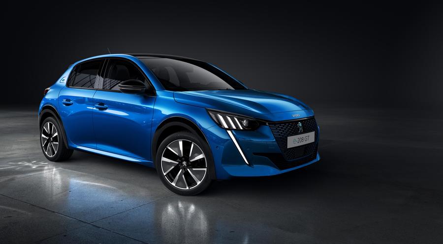 Peugeot e-208 Blue Peugeot e-208 parked in a dark room
