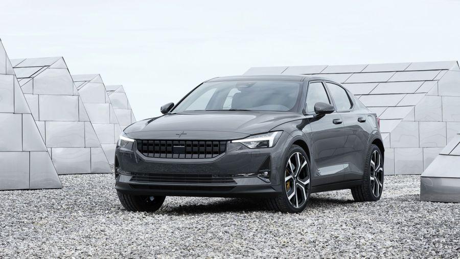 Polestar 2 Black Polestar 2 against white cliff tops