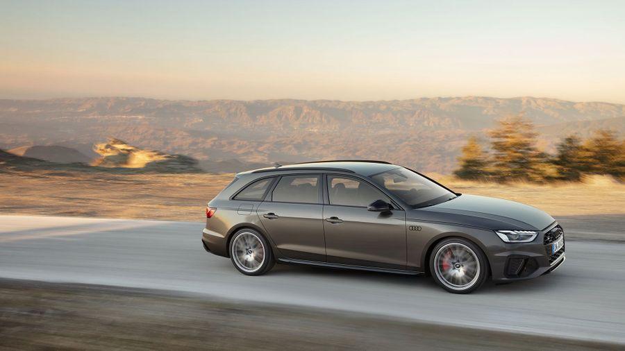 Audi A4 Allroad Grey Audi A4 Allroad driving through a sunrise