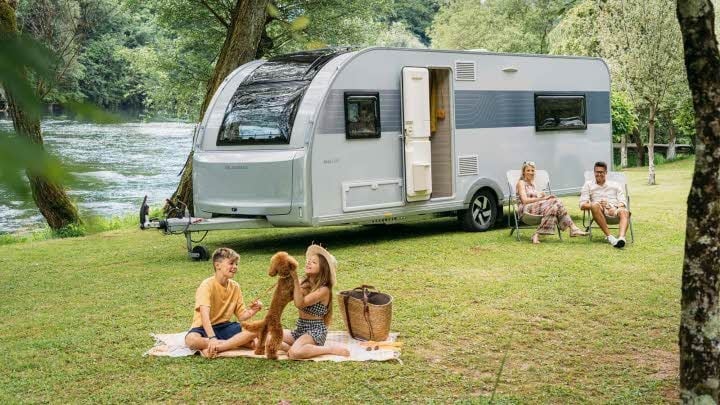 Adria Altea caravan parked on a campsite