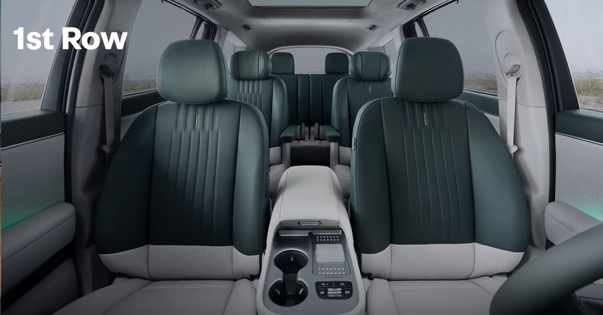 1st row seats cream and blue seats