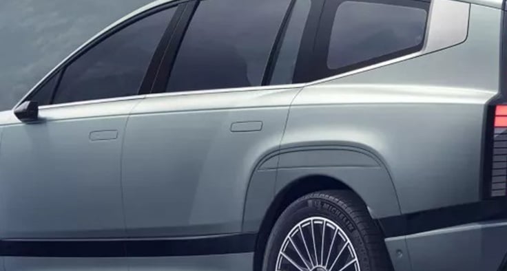 Ambient lighting auto flush door handle.