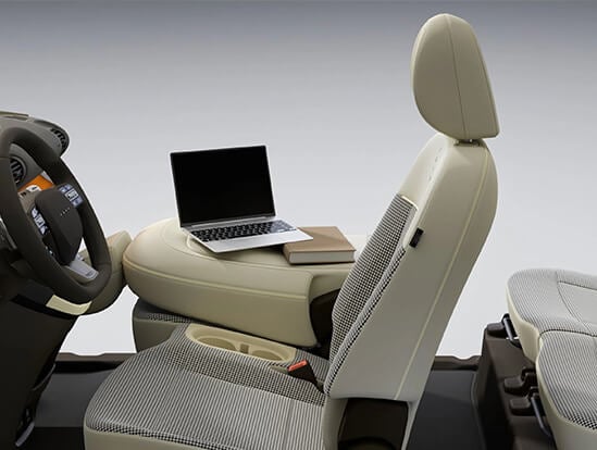 Foldable front passenger seat