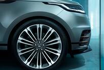 The close-up side view of the front wheel of a Range Rover Velar