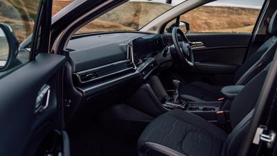 2022 Kia Sportage in black seats and dashboard