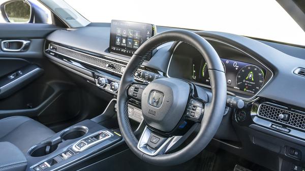 Blue 2022 Honda Civic steering wheel