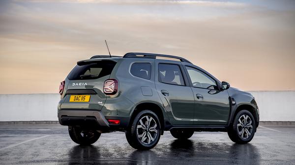 Green 2023 Dacia Duster parked